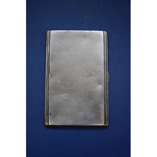 60 - An engine turned silver cigarette case, 167g; together with a sterling silver niello example.... 