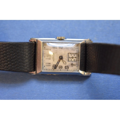 66 - A 1940s Jaeger Le Coultre gentlemans tank watch, case number 202559 on black leather strap.... 