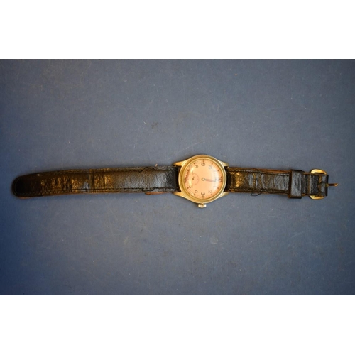 68 - A World War ll era ATP military wristwatch, by Bravington, on leather strap.