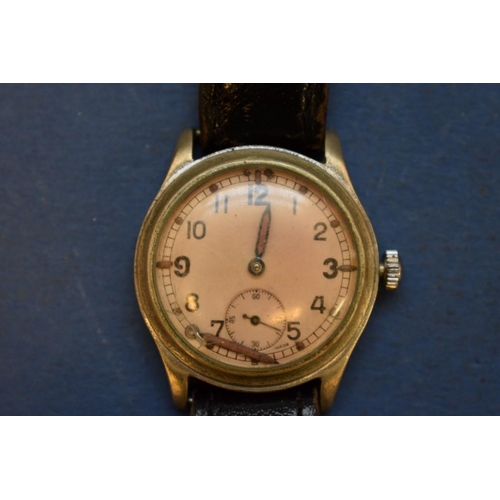 68 - A World War ll era ATP military wristwatch, by Bravington, on leather strap.