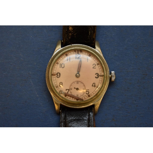 68 - A World War ll era ATP military wristwatch, by Bravington, on leather strap.