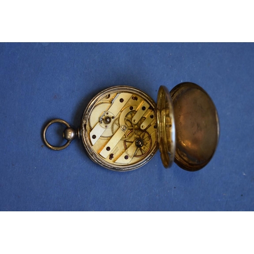 76 - An .800 open faced pocket watch, having enamel dial and Roman numerals; together with a Dupin open f... 