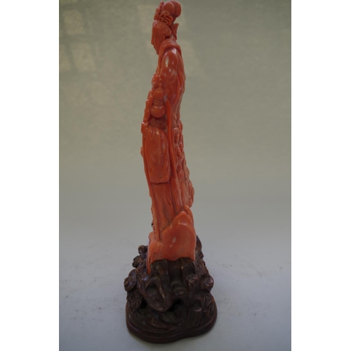 547 - A Chinese carved coral figure group of Guanyin, Qing, Signed, well carved, 19cm high, on a good carv... 