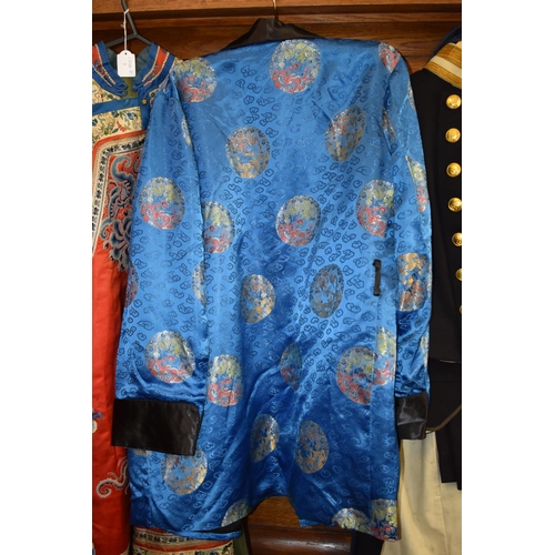 669 - A Chinese embroidered blue silk jacket. 