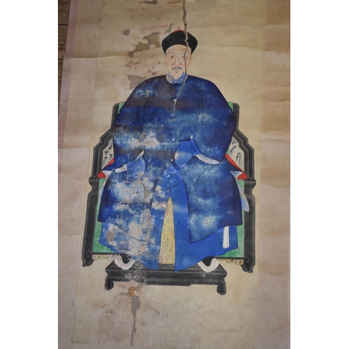 670 - Two similar Chinese ancestor portraits, Qing, the first depicting a Mandarin gentleman, wearing a bl... 