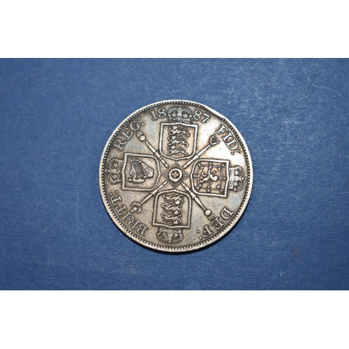 81A - A Victoria silver crown 1890; together with a silver half crown 1887 and various U.K and foreign coi... 