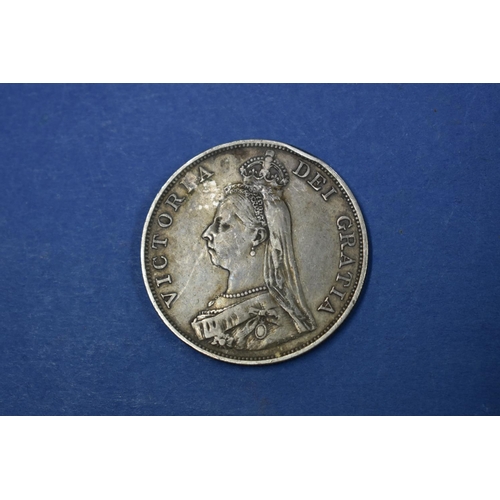 81A - A Victoria silver crown 1890; together with a silver half crown 1887 and various U.K and foreign coi... 