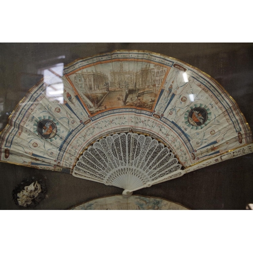 1752 - A framed display of four 19th century fans, to include a Chinese ivory brise example, the guards 27c... 