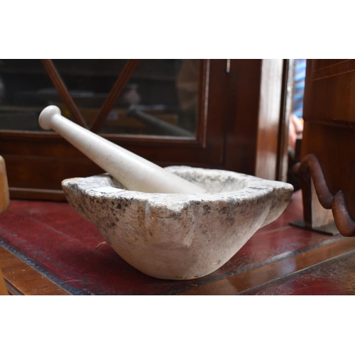 1320A - An old marble mortar, 26.5cm wide; and pottery pestle inscribed 'Meritor Haw Barnet'.... 