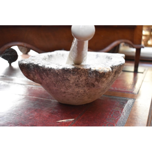 1320A - An old marble mortar, 26.5cm wide; and pottery pestle inscribed 'Meritor Haw Barnet'.... 