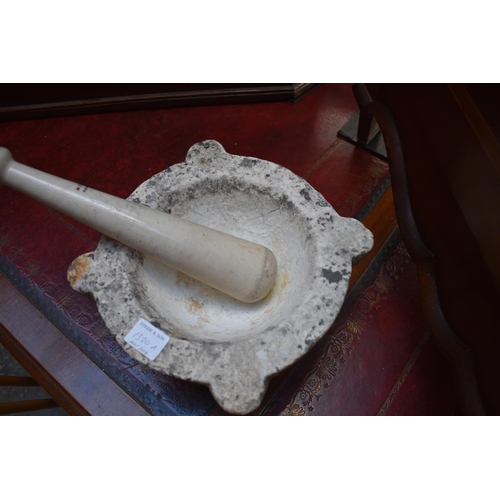 1320A - An old marble mortar, 26.5cm wide; and pottery pestle inscribed 'Meritor Haw Barnet'.... 