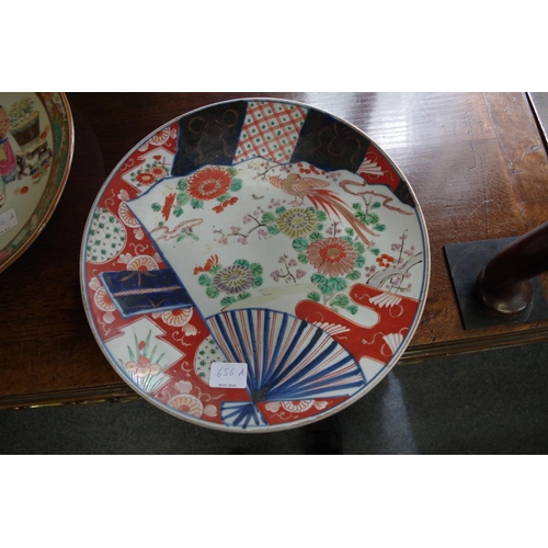 656A - A Chinese famille rose plate, 31cm diameter; together with another Japanese Imari plate. (2)... 