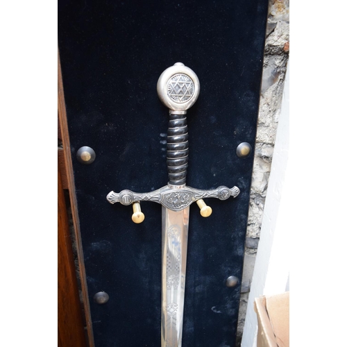 1291 - A reproduction crusader style sword, with 78cm blade, and wall mounted plaque stand. ... 