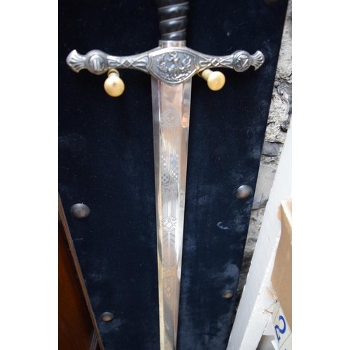 1291 - A reproduction crusader style sword, with 78cm blade, and wall mounted plaque stand. ... 