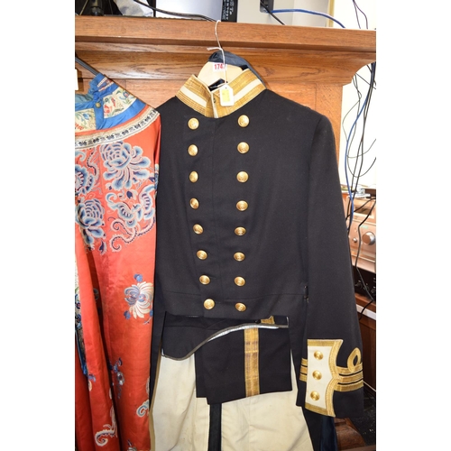 1747 - A late 19th/ early 20th century British Royal Naval Commander's uniform, comprising frock coat, trou... 