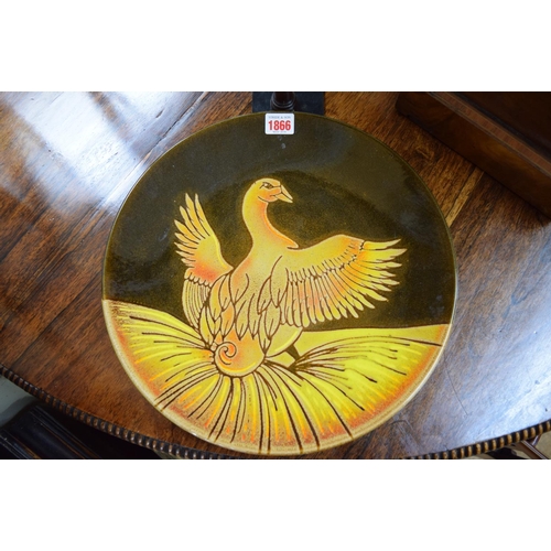 1866 - A Poole Agean charger, painted with a bird by D Davis, 35cm diameter.