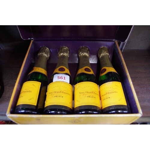 561 - Four 20cl bottles of Veuve Clicquot NV champagne, in card box.