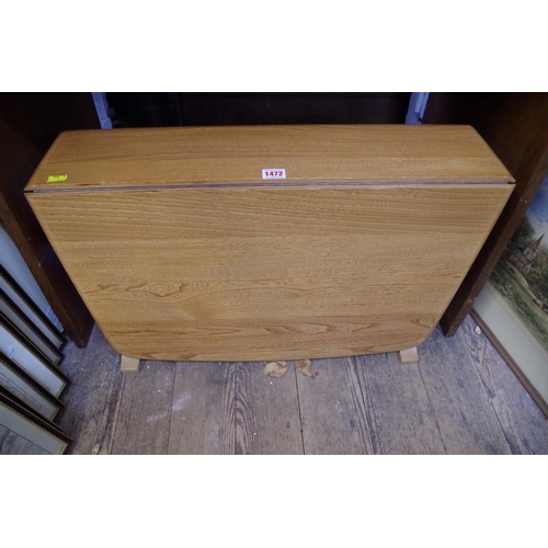 1472 - An Ercol drop leaf Sutherland table, 68.5cm wide.