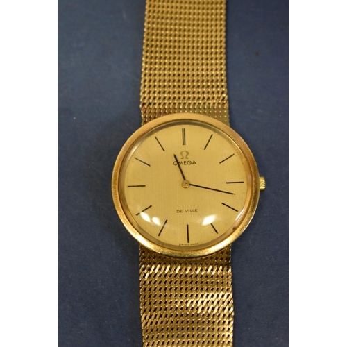 126 - An Omega Deville 9ct gold gentlemans wristwatch, on a 9ct gold mesh bracelet, 43.4g (without movemen... 