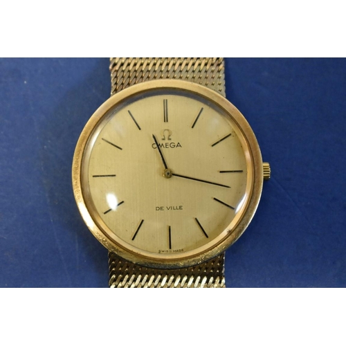 126 - An Omega Deville 9ct gold gentlemans wristwatch, on a 9ct gold mesh bracelet, 43.4g (without movemen... 