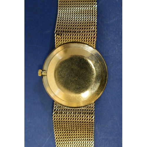 126 - An Omega Deville 9ct gold gentlemans wristwatch, on a 9ct gold mesh bracelet, 43.4g (without movemen... 