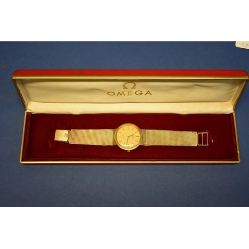 126 - An Omega Deville 9ct gold gentlemans wristwatch, on a 9ct gold mesh bracelet, 43.4g (without movemen... 