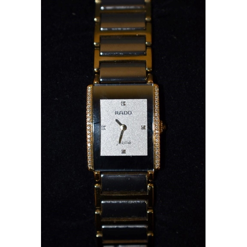 140 - A Rado Jubile ladies tank style wristwatch, set diamonds to sides and face, complete with original b... 