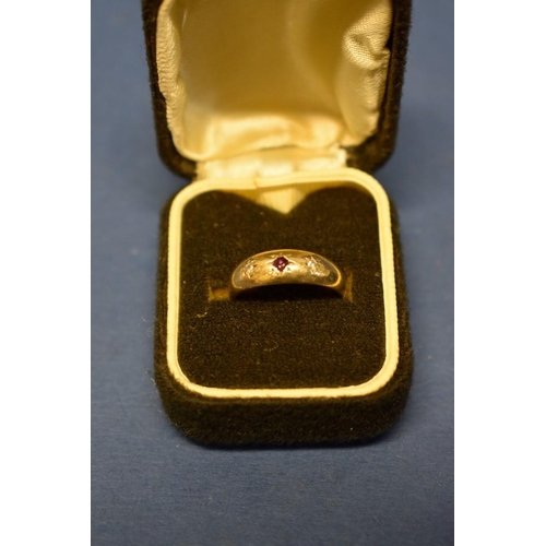 170 - Two 9ct gold gypsy set ruby rings; together with a pair of gold plated ear clips.