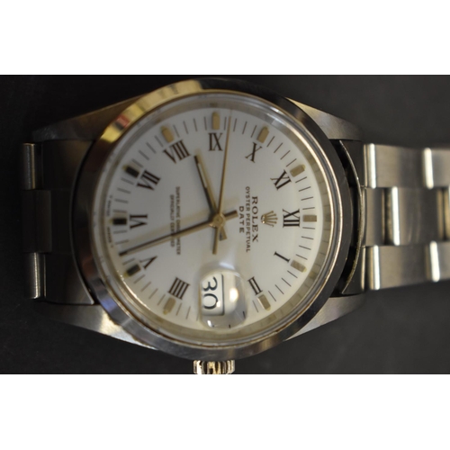 110 - A Rolex Oyster Perpetual Date automatic stainless steel gentlemans wristwatch, having white dial, 34... 