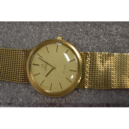 126 - An Omega Deville 9ct gold gentlemans wristwatch, on a 9ct gold mesh bracelet, 43.4g (without movemen... 