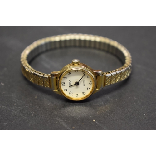 138 - A Royal London gold plated ladies quartz wristwatch, boxed; together with two other similar examples... 