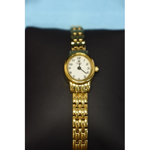 138 - A Royal London gold plated ladies quartz wristwatch, boxed; together with two other similar examples... 