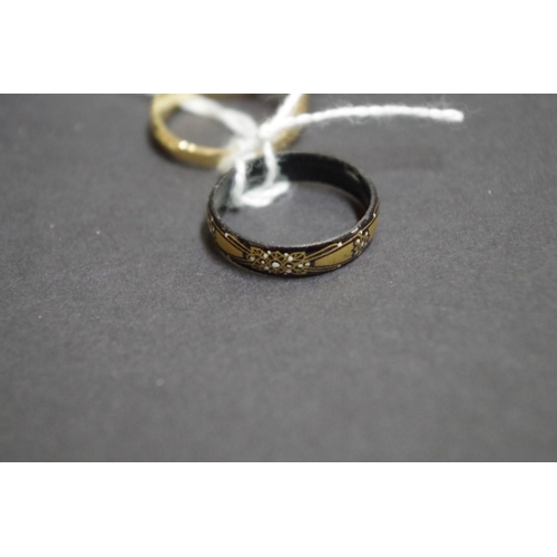 153 - An 18ct gold and black enamel memento mori ring set small diamond; together with a black and gold ba... 