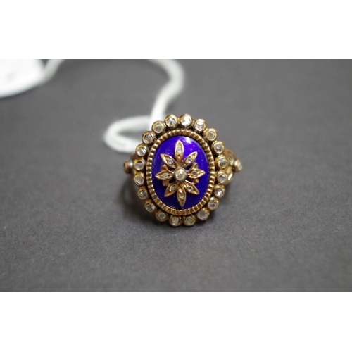 158 - A Continental 800 gold blue enamel and mine cut diamond set ring.