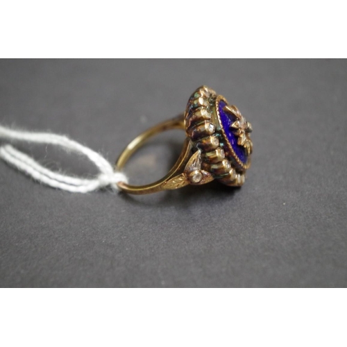 158 - A Continental 800 gold blue enamel and mine cut diamond set ring.