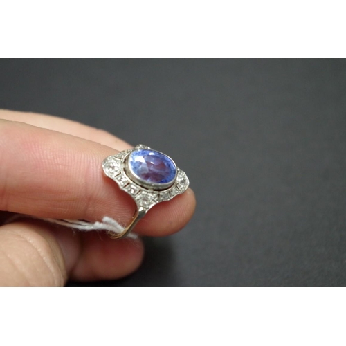 160 - An Edwardian oval sapphire and diamond ring, mounted in unmarked gold.