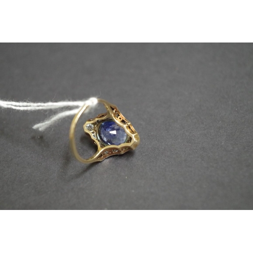 160 - An Edwardian oval sapphire and diamond ring, mounted in unmarked gold.