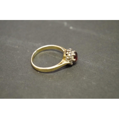 165 - An 18ct gold gem set ring; together with two 14K examples, (3).