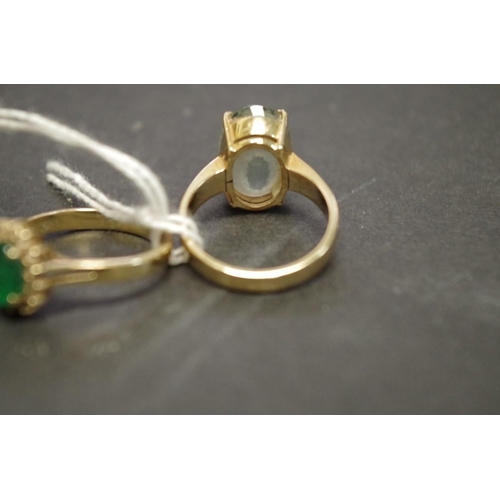 165 - An 18ct gold gem set ring; together with two 14K examples, (3).