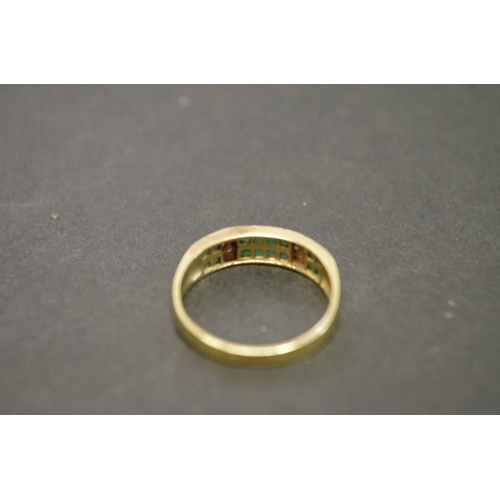 166 - An 18ct gold emerald and diamond ring; together with two 9ct gold rings.