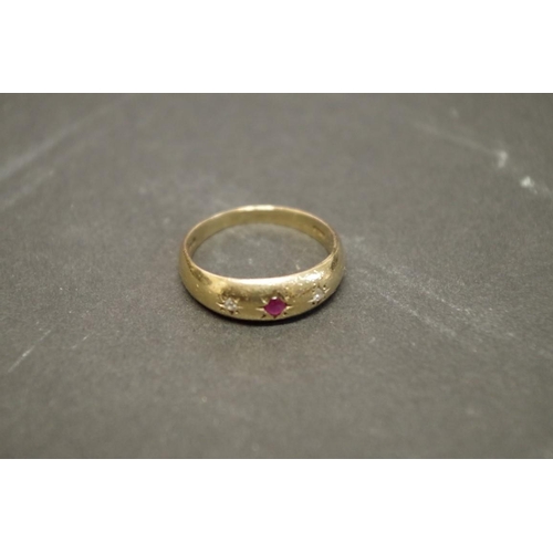 170 - Two 9ct gold gypsy set ruby rings; together with a pair of gold plated ear clips.