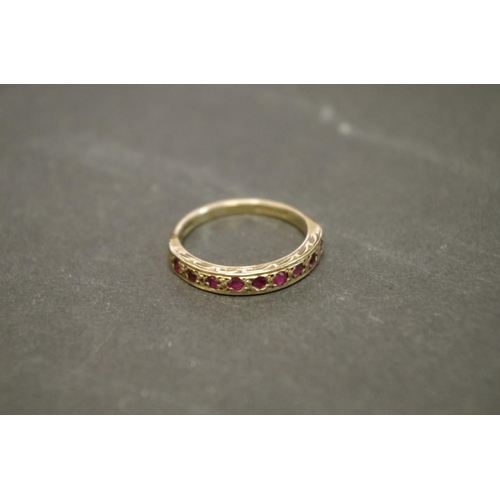 170 - Two 9ct gold gypsy set ruby rings; together with a pair of gold plated ear clips.