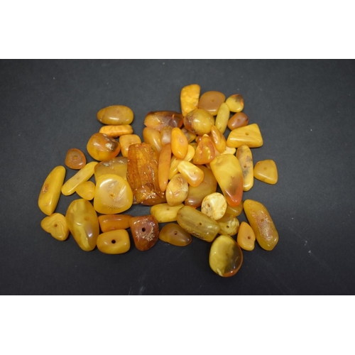 187 - A quantity of butterscotch amber style loose random cut beads, 89.5g.