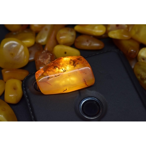 187 - A quantity of butterscotch amber style loose random cut beads, 89.5g.