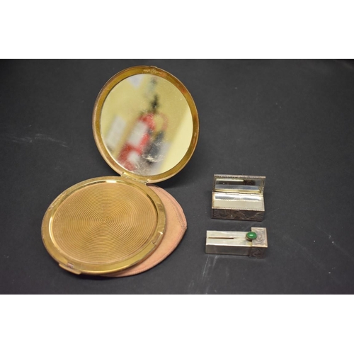 210 - A vintage LeRage compact, 11cm diameter, together with a Continental .800 silver lipstick and mirror... 