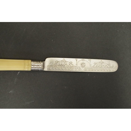 65 - A Victorian silver cake knife, by Richard Martin & Ebenezer Hall & Co, Sheffield 1878, 19.5c... 