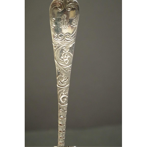 72 - A Georgian silver gilt berry spoon, by Hester Bateman, London 1780; together with a similar example,... 