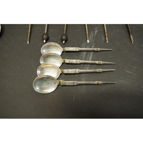 80 - A quantity of silver teaspoons; together with four mother of pearl handled silver knives; and three ... 