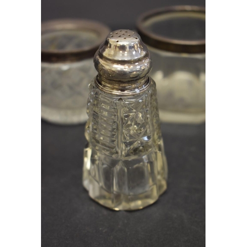 93 - A large quantity of silver mounted cruets, salts and jars.