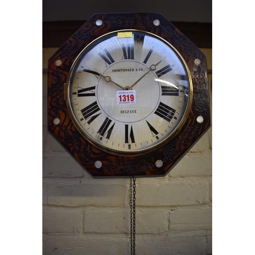 1319 - A Black Forest 30 hour wall clock, 32cm wide, with weights and pendulum. 